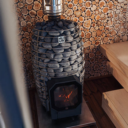 HUUM HIVE Flow wood-burning sauna stove installed sauna environment