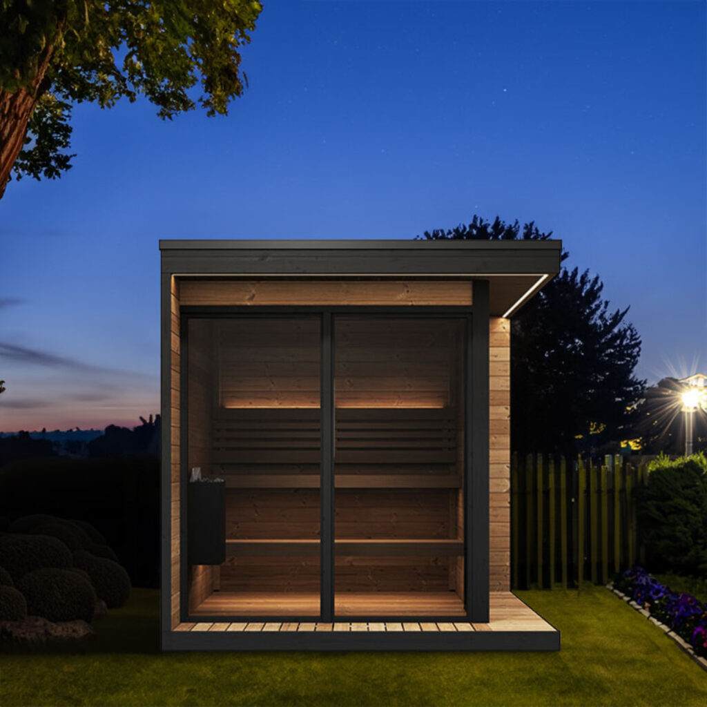 SaunaLife GL6 outdoor sauna illuminated at night